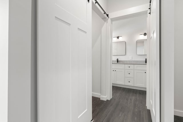 bathroom with vanity and hardwood / wood-style flooring