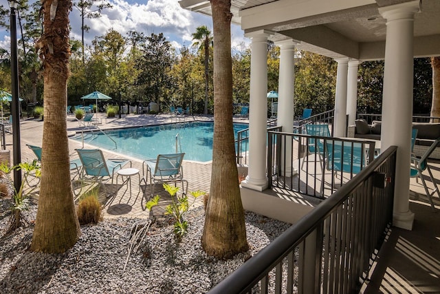 view of swimming pool featuring a patio