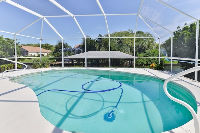 view of pool featuring a lanai