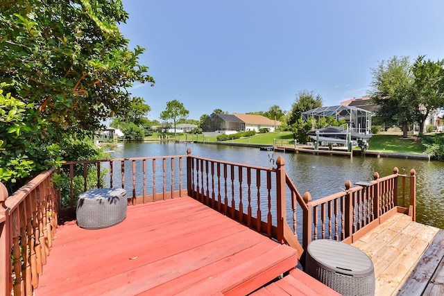 dock area with a water view