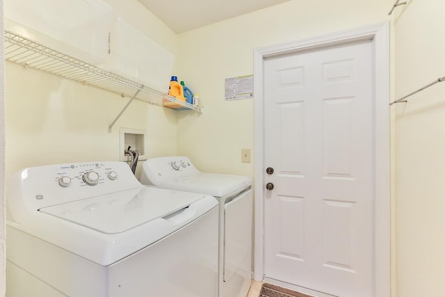 laundry area featuring separate washer and dryer