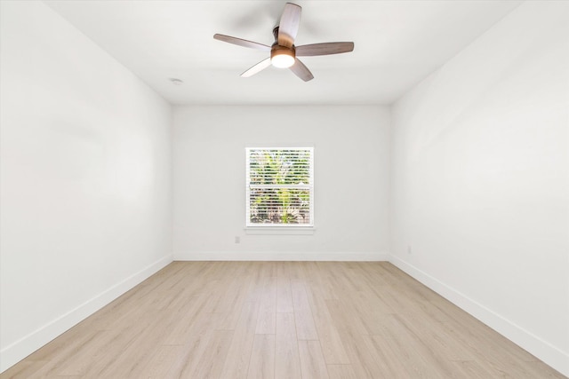 unfurnished room featuring light hardwood / wood-style flooring and ceiling fan