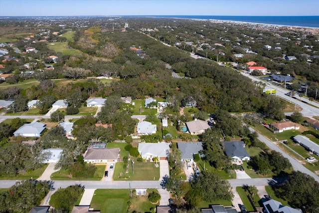 aerial view with a residential view and a water view