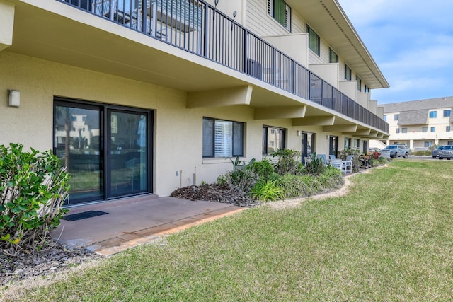 exterior space with a lawn