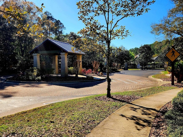 119 Duck Pond Dr, Saint Augustine, FL 32086 - view of street with curbs, traffic signs, and sidewalks