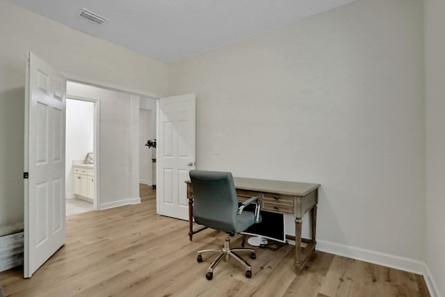 119 Duck Pond Dr, Saint Augustine, FL 32086 - office with visible vents, baseboards, and light wood-style floors