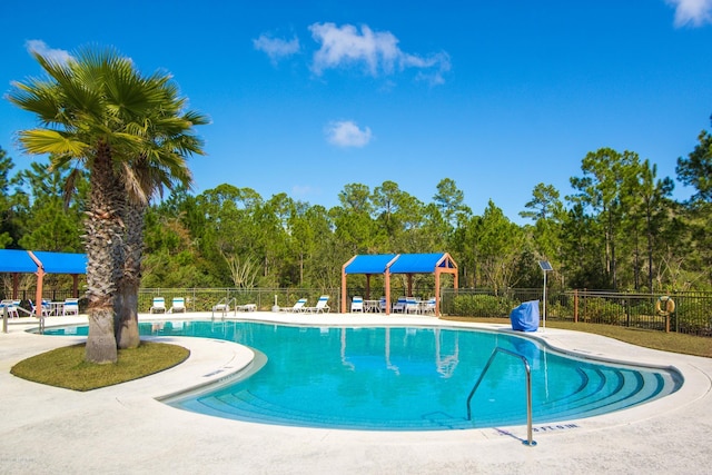 119 Duck Pond Dr, Saint Augustine, FL 32086 - community pool featuring a patio area and fence