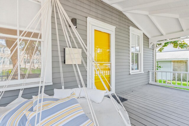 entrance to property featuring a deck