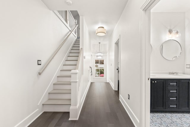 interior space with hardwood / wood-style flooring and sink