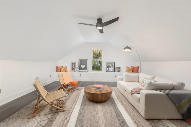 interior space with wood-type flooring, ceiling fan, and vaulted ceiling