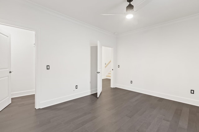 unfurnished bedroom featuring crown molding, dark wood-type flooring, and ceiling fan