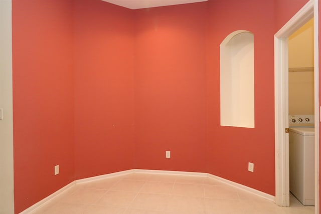 5850 Cypress Estates Dr, Elkton, FL 32033 - unfurnished room with washer / dryer, baseboards, and tile patterned flooring