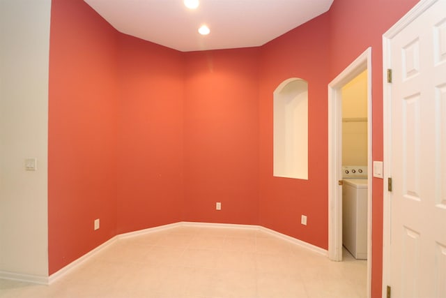 5850 Cypress Estates Dr, Elkton, FL 32033 - spare room featuring light tile patterned floors, baseboards, washer / dryer, and recessed lighting