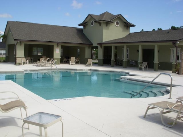 5850 Cypress Estates Dr, Elkton, FL 32033 - community pool with a patio area