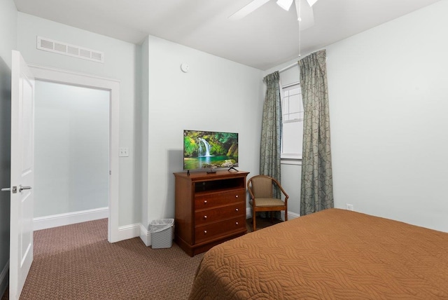 bedroom with baseboards, visible vents, ceiling fan, and carpet flooring