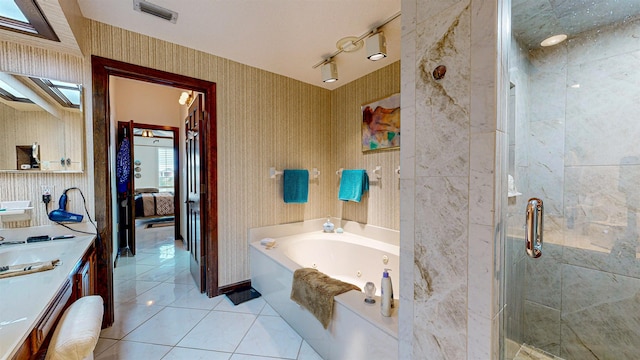 bathroom with separate shower and tub, tile patterned floors, and vanity