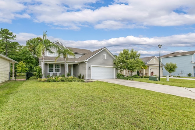 view of front of home with a front lawn and a garage