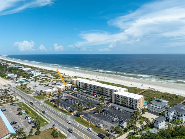 bird's eye view featuring a beach view and a water view