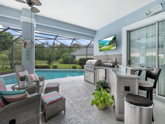 1201 Ellington Ct, Saint Augustine, FL 32084 - swimming pool featuring area for grilling, a patio, a lanai, and ceiling fan