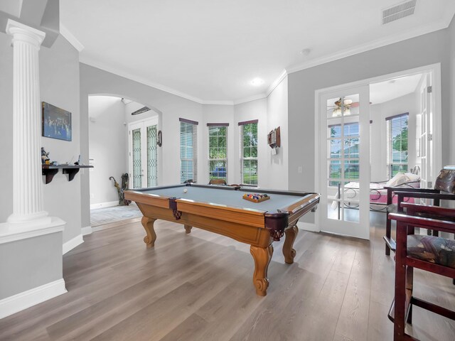 1201 Ellington Ct, Saint Augustine, FL 32084 - game room with healthy amount of natural light, ornamental molding, wood finished floors, arched walkways, and pool table