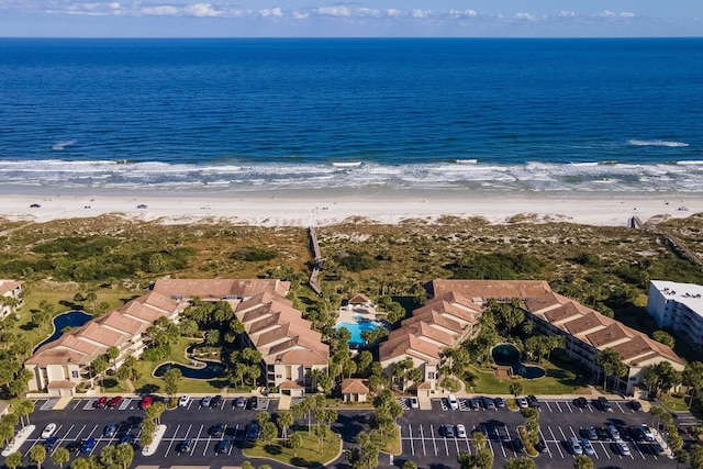 aerial view featuring a water view and a beach view