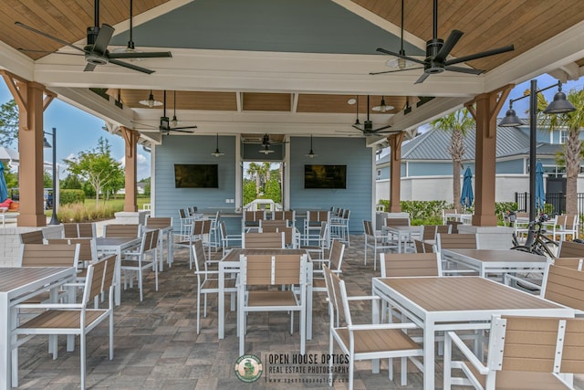 view of patio / terrace with ceiling fan and outdoor dining space