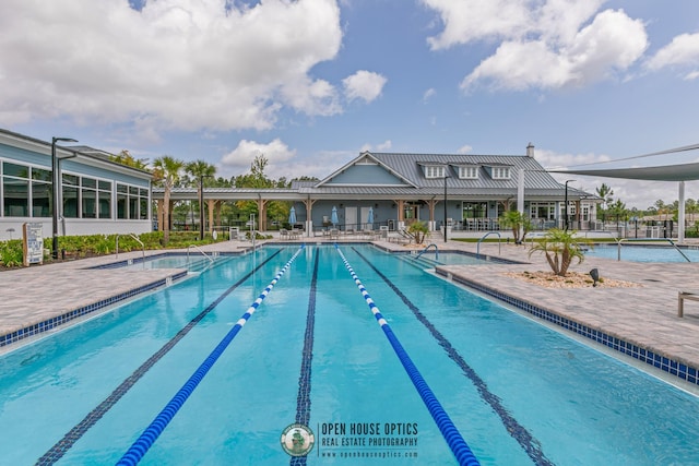 pool with a patio area
