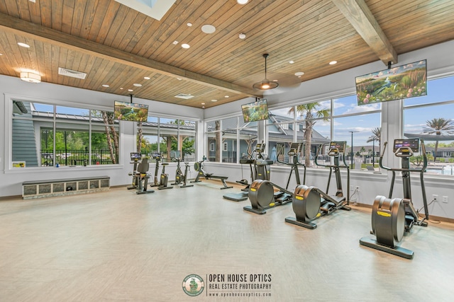 workout area featuring recessed lighting, baseboards, plenty of natural light, and wood ceiling