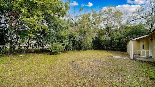 view of yard featuring fence