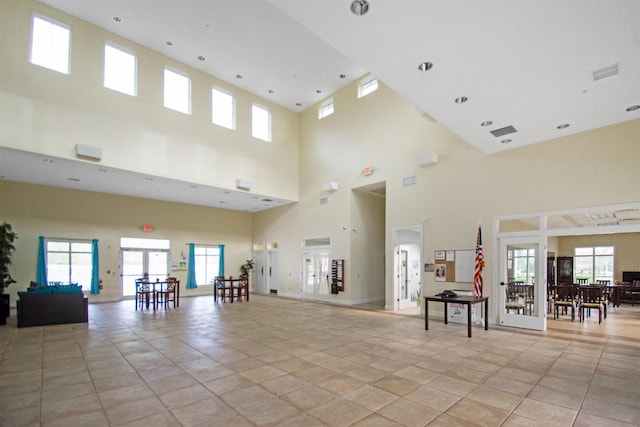 lobby featuring a towering ceiling
