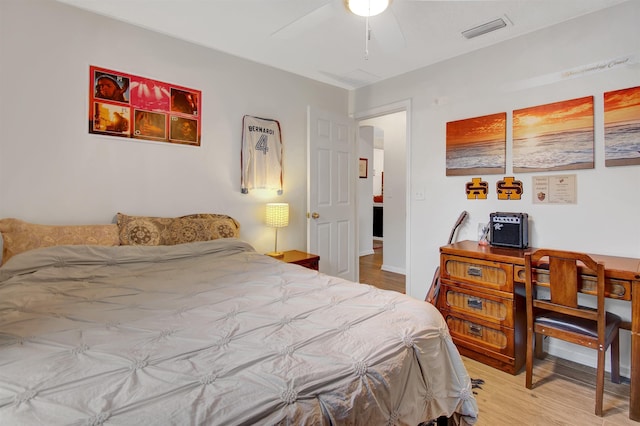 bedroom featuring wood finished floors and a ceiling fan