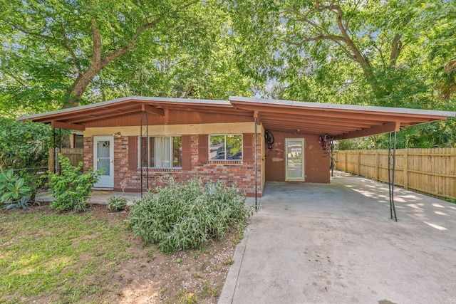 view of front of property with a carport