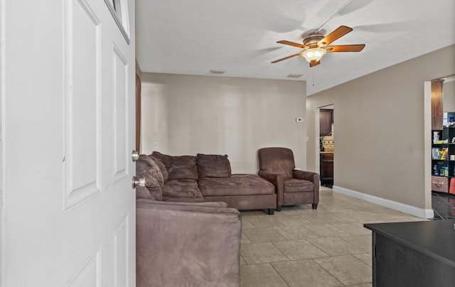 living room featuring ceiling fan