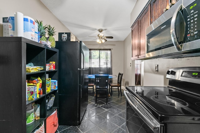 kitchen with ceiling fan, appliances with stainless steel finishes, and dark brown cabinets