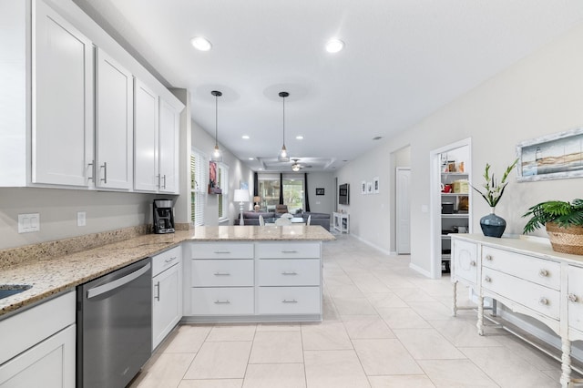 kitchen featuring pendant lighting, open floor plan, white cabinetry, a peninsula, and dishwasher