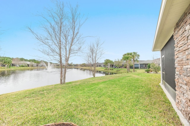 view of yard with a water view