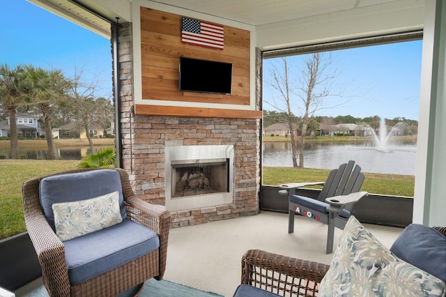 view of patio / terrace featuring an outdoor fireplace