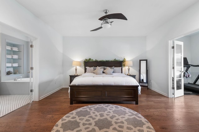 19 Smiling Fish Ln, Palm Coast, FL 32137 - bedroom featuring dark wood-style floors, ensuite bath, and ceiling fan