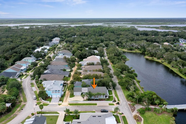 19 Smiling Fish Ln, Palm Coast, FL 32137 - aerial view of property and surrounding area with a large body of water and nearby suburban area