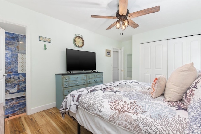 13 Douglas Ave, Saint Augustine, FL 32084 - bedroom with wood finished floors, a closet, baseboards, and a ceiling fan