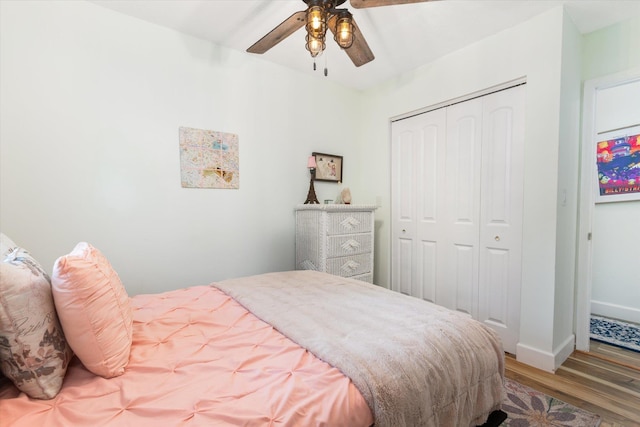 13 Douglas Ave, Saint Augustine, FL 32084 - bedroom featuring wood finished floors, a closet, baseboards, and a ceiling fan