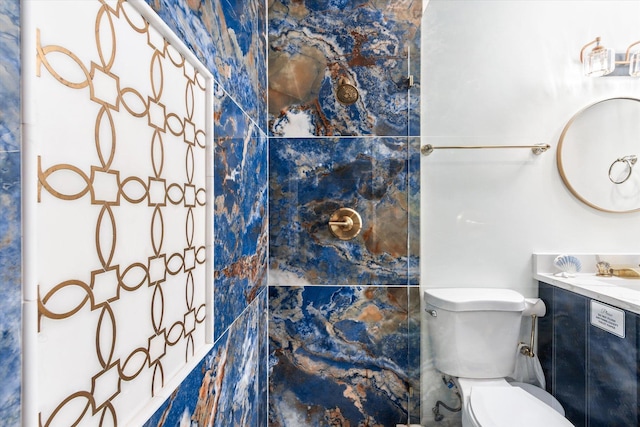 13 Douglas Ave, Saint Augustine, FL 32084 - full bathroom featuring toilet, vanity, and a shower