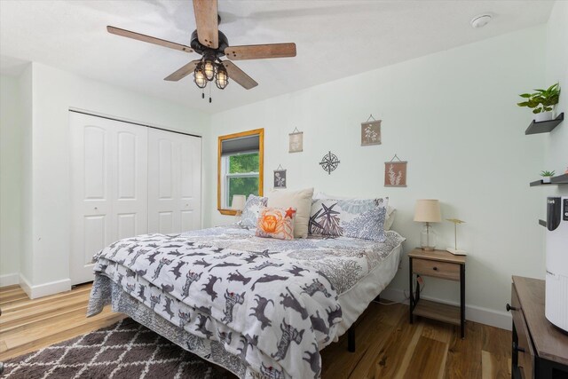 13 Douglas Ave, Saint Augustine, FL 32084 - bedroom featuring a closet, wood finished floors, baseboards, and a ceiling fan