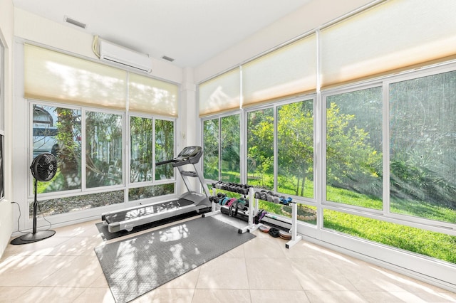 workout room featuring tile patterned flooring, a wall mounted air conditioner, and visible vents