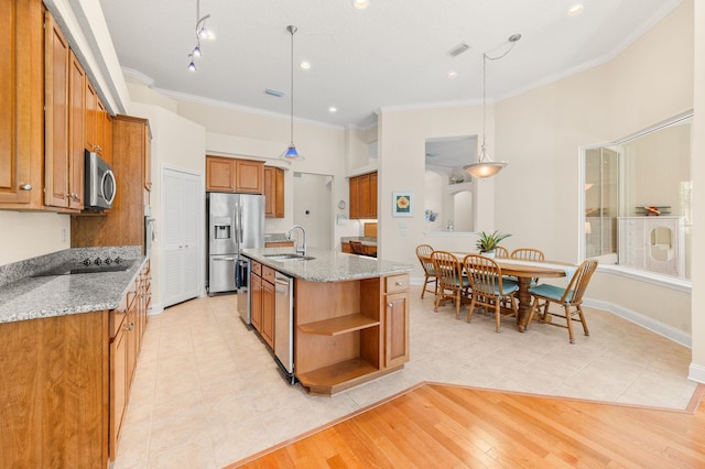 kitchen featuring crown molding, open shelves, a sink, brown cabinetry, and stainless steel appliances