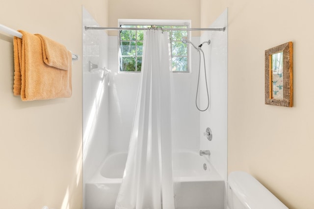 full bath featuring toilet and shower / tub combo