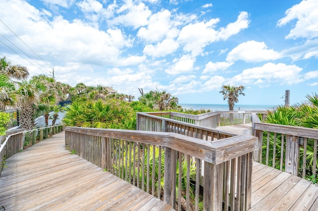 wooden terrace with a water view