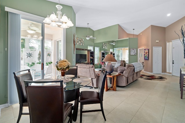 1101 Royal Troon Ln, Saint Augustine, FL 32086 - dining room with light tile patterned floors, high vaulted ceiling, ceiling fan with notable chandelier, and baseboards