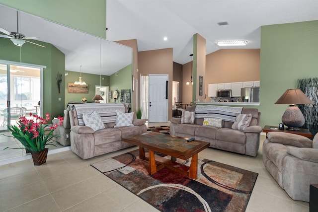 1101 Royal Troon Ln, Saint Augustine, FL 32086 - living area featuring light tile patterned floors, visible vents, high vaulted ceiling, and ceiling fan