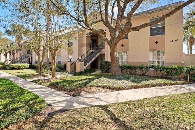 1101 Royal Troon Ln, Saint Augustine, FL 32086 - view of property featuring stairway